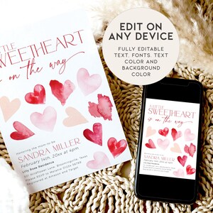 May include: A printable baby shower invitation with a pink and red watercolor heart design. The text reads "A Little Sweetheart is on the way" and includes the name Sandra Miller, the date, time, and location of the event. The invitation also includes information about RSVP and gift registry.