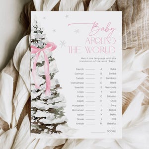 May include: A printable baby shower game with a pink watercolor illustration of a Christmas tree. The game asks players to match the language with the translation of the word "Baby" in different languages, such as French, German, Turkish, Vietnamese, Swedish, Greek, Polish, Czech, Hungarian, Romanian, Italian, Slovak, and Finnish.