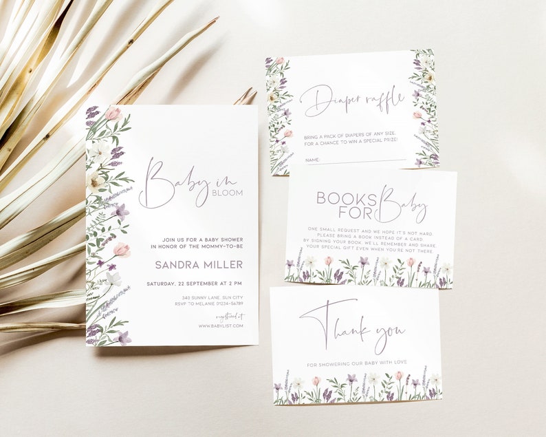 May include: A set of four baby shower cards with floral designs. The cards include an invitation, a diaper raffle card, a "books for baby" card, and a thank you card. The cards are all white with purple and pink floral accents.