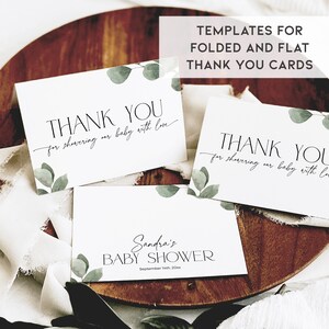 May include: Three printable thank you cards with a eucalyptus leaf design. The cards say "Thank you for showering our baby with love". The text "Templates for folded and flat thank you cards" is at the top of the image.