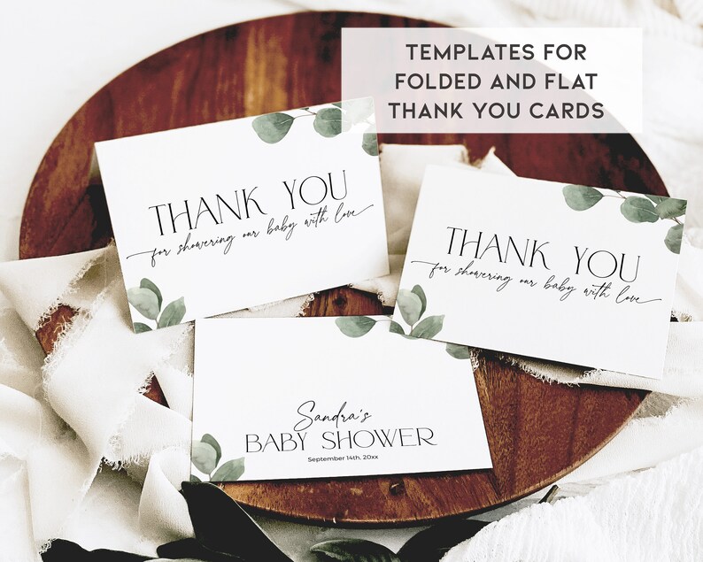 May include: Three printable thank you cards with a eucalyptus leaf design. The cards say "Thank you for showering our baby with love". The text "Templates for folded and flat thank you cards" is at the top of the image.
