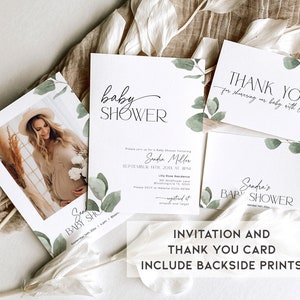 May include: A set of two printable cards for a baby shower. The invitation card features a watercolor illustration of eucalyptus leaves and the text "baby shower". The thank you card features the text "Thank you for showering our baby with love".