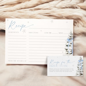 May include: A printable recipe card with a wintery blue and white design. The card has a space for the recipe title, ingredients, directions, cook time, and servings. The text "Recipe for the Bride-to-Be" is on a smaller card with a similar design.