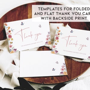 May include: Two thank you cards with a floral design and butterflies. The text on the cards reads "Thank you for showering our baby with love".