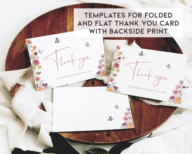 May include: Two thank you cards with a floral design and butterflies. The text on the cards reads "Thank you for showering our baby with love".