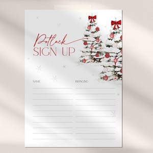 May include: A white paper sign with red text that reads "Potluck SIGN UP". The sign features watercolor illustrations of snow-covered Christmas trees decorated with red bows and ornaments. Lines are provided for names and what people are bringing.