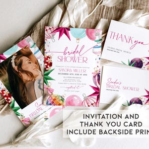 May include: Invitation and thank you card set for a bridal shower with a watercolor design featuring pink, purple, and green ornaments. The text on the invitation reads "Bridal Shower" and "Sandra Miller" with the date and time of the event. The thank you card reads "Thank you" and "Sandra's Bridal Shower".