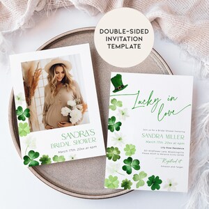 May include: Double-sided invitation template with a green shamrock and leprechaun hat design. The front of the card says "Lucky in Love" and the back has a photo of a pregnant woman and the text "Sandra's Bridal Shower, March 17th 20xx at 4pm".