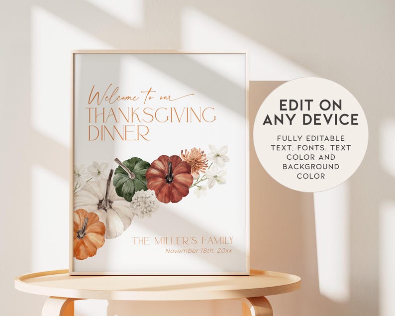 May include: A framed Thanksgiving dinner sign with the text "Welcome to our Thanksgiving Dinner" in copper-colored script. The sign features watercolor pumpkins and flowers. Additional text reads "Edit on any device".