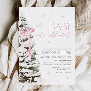 May include: A baby shower invitation with a watercolor illustration of a snowy pine tree with a pink ribbon. The text reads "Baby it's cold outside" and includes the name Sandra Miller, the date December 14th, 20xx at 4pm, the location Lilly Rose Residence, and the address 301 Wildflower Lane, Bloomingville. The invitation also includes the RSVP information and the registry information.