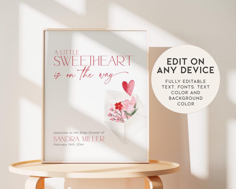 May include: A printable baby shower invitation with a pink and red watercolor design. The text reads "A little sweetheart is on the way." and "Welcome to the Baby Shower of Sandra Miller, February 14th, 20xx".