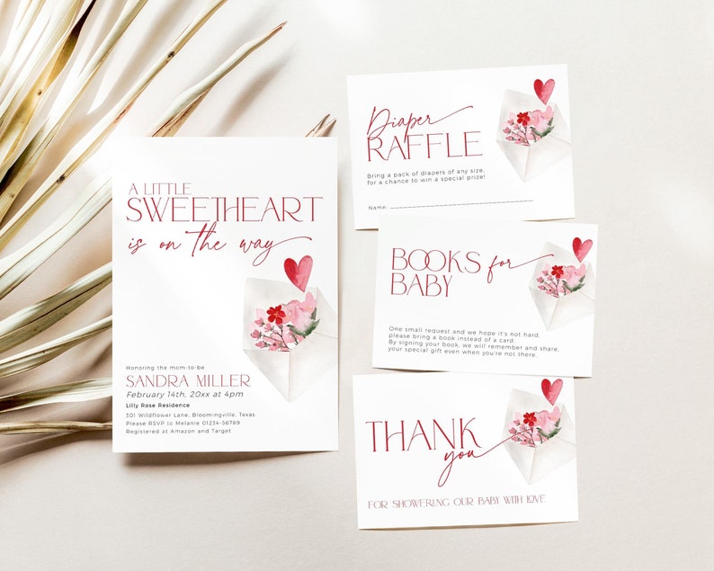 May include: A baby shower invitation with a pink and red watercolor illustration of a closed envelope with flowers and a heart. The text reads "A Little Sweetheart is on the way" and includes the name Sandra Miller, the date and time of the shower, and the location. The invitation also includes information about the registry and RSVP.
