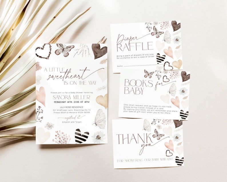 May include: A baby shower invitation with a watercolor design featuring butterflies, hearts, and floral elements. The invitation reads "A Little Sweetheart is on the Way" and includes the name Sandra Miller, the date February 14th, 2023 at 4pm, and the location Lilly Rose Residence. There are also three cards for a diaper raffle, books for baby, and a thank you card.