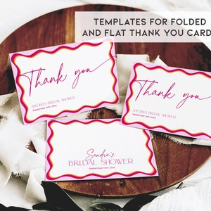 May include: Three pink thank you cards with a wavy border in shades of pink, orange, and red. The cards have the text "Thank you" and "Sandra's Bridal Shower" with the date.
