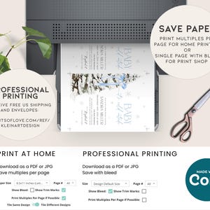 May include: A printable baby shower invitation with a winter theme. The invitation features a blue and white color scheme with a watercolor illustration of a snowy forest and a baby blue ribbon. The text on the invitation reads "Baby it's cold outside".