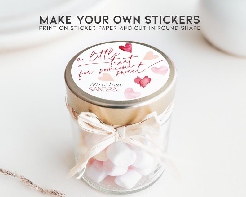 May include: A glass jar filled with white marshmallows, topped with a gold lid and a round sticker that reads "a little treat for someone sweet" with a red heart and the words "With love SANDRA".