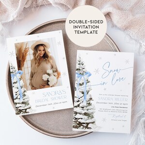 May include: A double-sided invitation template for a bridal shower with a winter theme. The front features a watercolor illustration of a snowy pine tree with a blue ribbon. The back features a photo of the bride-to-be and the text "Sandra's Bridal Shower" and "December 14th, 20xx at 4pm". The text "Snow in Love" is written in a cursive font.