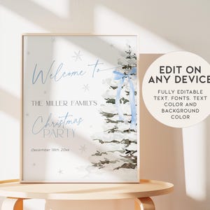 May include: A printable Christmas party sign with a watercolor illustration of a white Christmas tree with blue ribbon. The text reads "Welcome to The Miller Family's Christmas Party December 18th, 20xx".