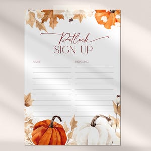 May include: A white paper sign-up sheet with the words "Potluck SIGN UP" in burgundy script. The design includes watercolor pumpkins, leaves, and floral accents in shades of orange, brown, and white, perfect for fall events.