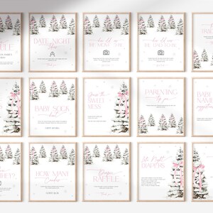 May include: A set of 12 printable baby shower game cards featuring a winter wonderland theme with pink accents. The cards include games like "Advice and Wishes", "Baby Sock Hunt", "Guess the Sweet Mess", "Parenting Tips for You", "Baby Name Suggestions", "Where Were They?", "How Many Candies", "Diaper Raffle", "Date Night Ideas", "Time Capsule", "How Old Was the Mom-to-Be", "How Old Was the Dad-to-Be", and "Family Traditions".