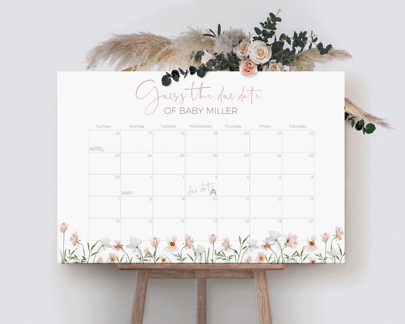 May include: A white calendar with a floral border. The calendar is for April and May and has the text "Guess the due date of Baby Miller" at the top. The due date is marked on the calendar as May 9th.