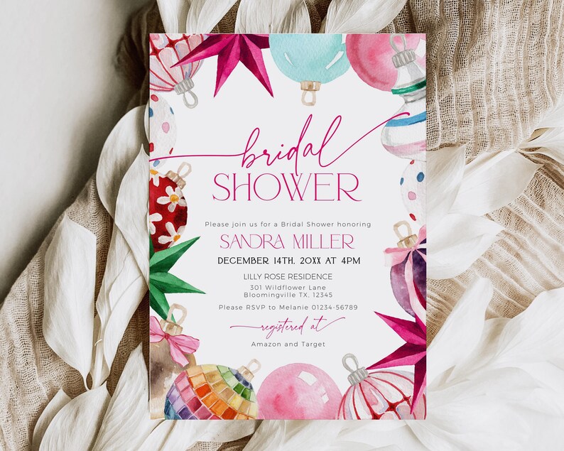 Puede incluir: Una invitaci&oacute;n de ducha nupcial blanca con adornos de acuarela rosa y rojo. El texto dice "bridal shower" en escritura cursiva rosa y "Please join us for a bridal shower honoring Sandra Miller December 14th, 20XX at 4PM Lilly Rose Residence 301 Wildflower Lane Bloomingville TX 12545 Please RSVP to Melanie 01234-56789 registered at Amazon and Target".