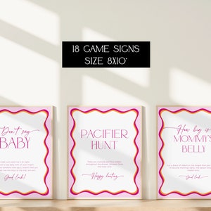May include: Three printable 8x10 inch signs for a baby shower game. The signs are pink with a wavy border and gold text. The signs read "Don't say baby", "Pacifier Hunt", and "How big is Mommy's Belly".