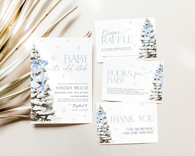 May include: A baby shower invitation with a winter theme. The invitation features a blue and white watercolor illustration of a pine tree with a blue bow. The text on the invitation reads "Baby it's cold outside" and includes the name "Sandra Miller" and the date and time of the shower. The invitation also includes information about the location of the shower and where to register for gifts.