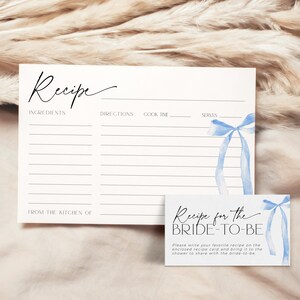 May include: A printable recipe card with a blue watercolor ribbon design. The card has sections for ingredients, directions, cook time, and servings. The text "Recipe for the Bride-to-Be" is on a separate card with a blue watercolor ribbon design.