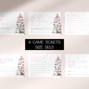 May include: Six printable game tickets for a baby shower. Each ticket features a winter-themed design with a pink bow and a white background. The tickets include games such as "Diaper Raffle", "How Big is Mommy's Belly", "Baby Name Suggestions", "Advice and Wishes", "One Baby", and "How Many Candies Are in the Jar".