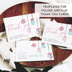 May include: Three printable thank you cards featuring a pink and blue Christmas ornament design. The text on the cards reads "Thank you for showering our baby with love".