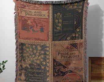 May include: A woven throw blanket featuring four distinct panels depicting various Pride and Prejudice book cover designs. The imagery includes peacock feather motifs, floral illustrations, and text reading Pride and Prejudice by Jane Austen.