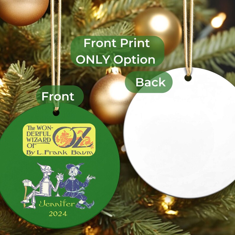 two christmas ornaments hanging from a christmas tree
