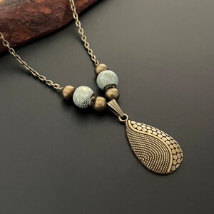Long bronze necklace clearance