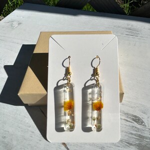 Dainty resin dangle earrings with gold flakes and real orange and white  baby&#39;s breath flowers- perfect for summer!