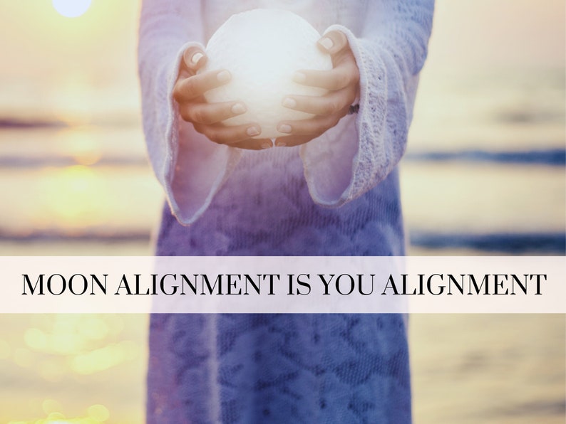 May include: A person holding a white orb in their hands, with the text "MOON ALIGNMENT IS YOU ALIGNMENT" across the bottom of the image.