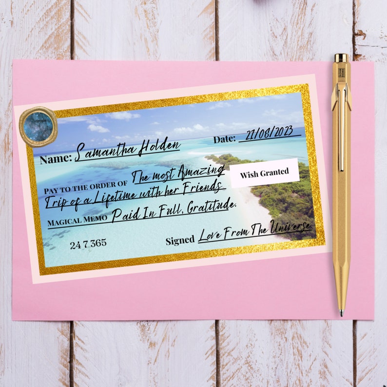 May include: A mock-up of a wish granted cheque with a tropical beach scene. The cheque is made out to Samantha Holden for "The most Amazing Trip of a Lifetime with her Friends." The cheque is dated 21/06/2023 and signed "Love From The Universe".