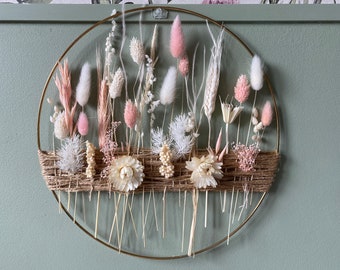 Sweet wreath on gold hoop. Romantic gold hoop with dried flowers in garden style. Wall hanging art for Valentine's Day