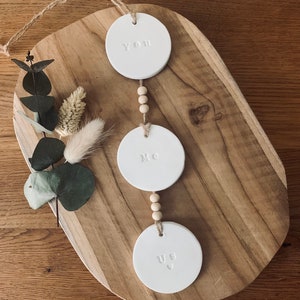 Garland with three pendants made of modeling clay l You, I, we l You, Me, Us l Dreamcatcher l