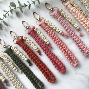 There is a personal name next to the macrame key chains, which are knitted with 100% natural cotton yarn.