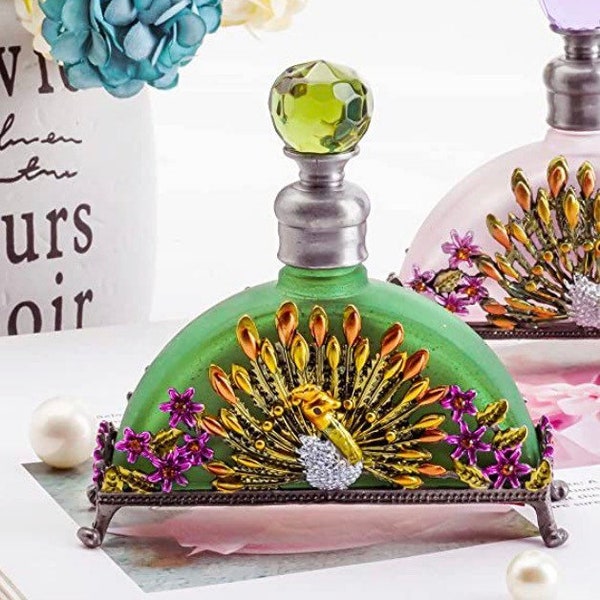 New perfume or essential oil bottleI. Thecolor of a green peacock and very unique is hand made crystal art deco bottle a wonderful gift.