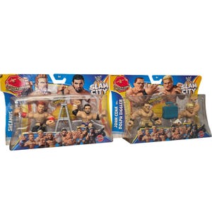 May include: Two WWE Slam City action figure sets. One set features Sheamus and another wrestler with a ladder. The other set features John Cena vs. Dolph Ziggler with a briefcase. The packaging is blue, yellow, and red.