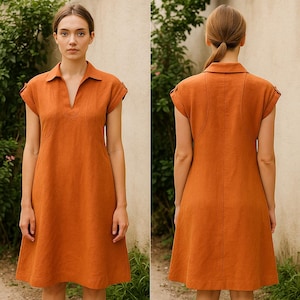 May include: A burnt orange dress with a collared neckline and short sleeves. The dress features a V-neck and a slightly flared skirt. The fabric appears to be linen or a similar textured material. The dress is shown from the front and back.