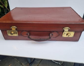 Antique brown leather suitcase with brass locks 55cm