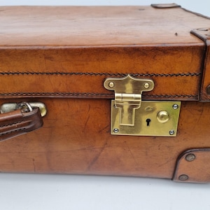 Tan leather antique suitcase, 26&quot; in excellent condition,c 1880. Exceptional quality.
