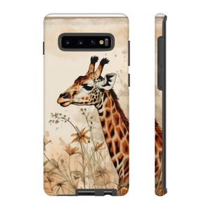 May include: A phone case with a watercolor illustration of a giraffe with brown and tan spots, looking to the left, with a background of brown and beige watercolor flowers.
