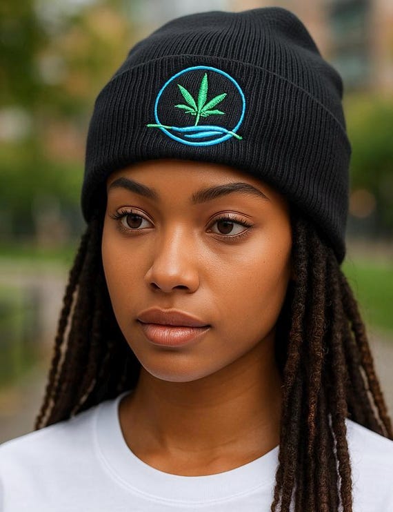 Marijuana logo embroidered beanie 100 percent acrylic wool to display favorite herb proudly on cuffed beanie hat unisex