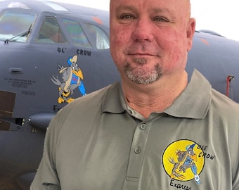 B-52 nose art Polo: Ole Crow a Perfect Blend of Comfort, Durability, and Professional Style left chest  embroidered with B-52 nose art