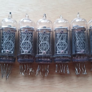 Lot of 7 in-14 Nixie tubes. Same production year. For Nixie clock. Tested