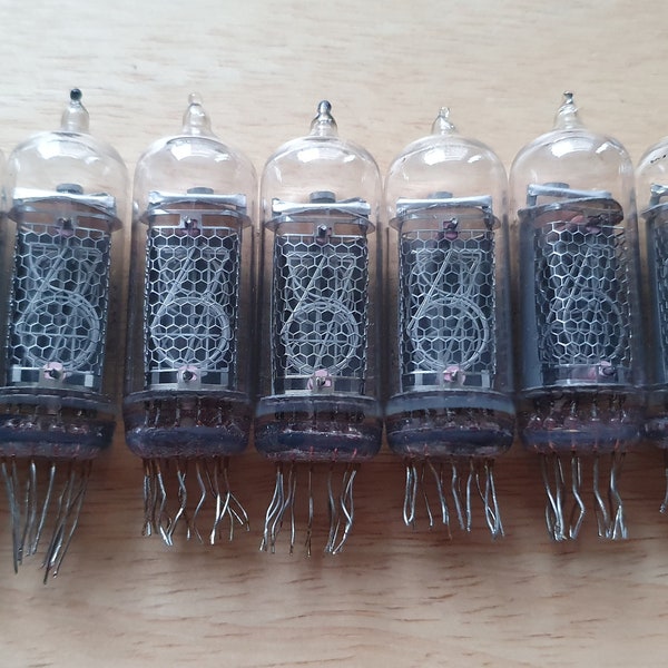 Lot of 7 in-14 Nixie tubes. Same production year. For Nixie clock. Tested